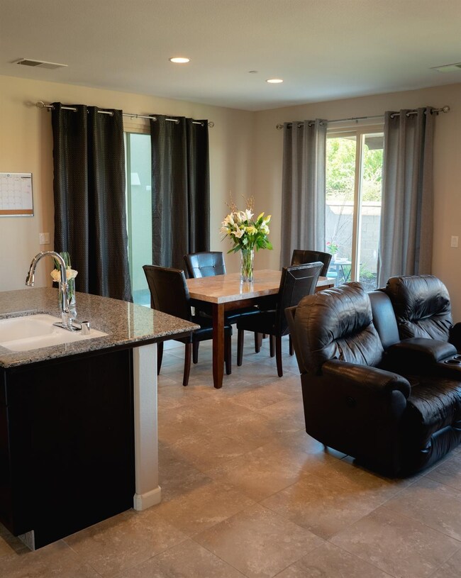Two large sliding glass doors provide plenty of da