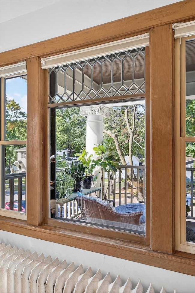 Original beveled glass in diamond cut formation is one of many original details in this home.