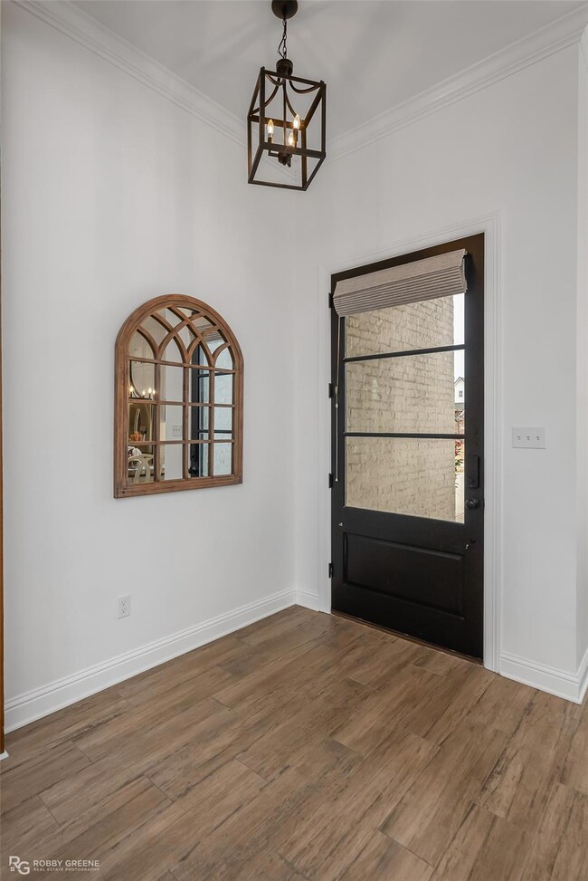 Entryway featuring dark hardwood / wood-style floo