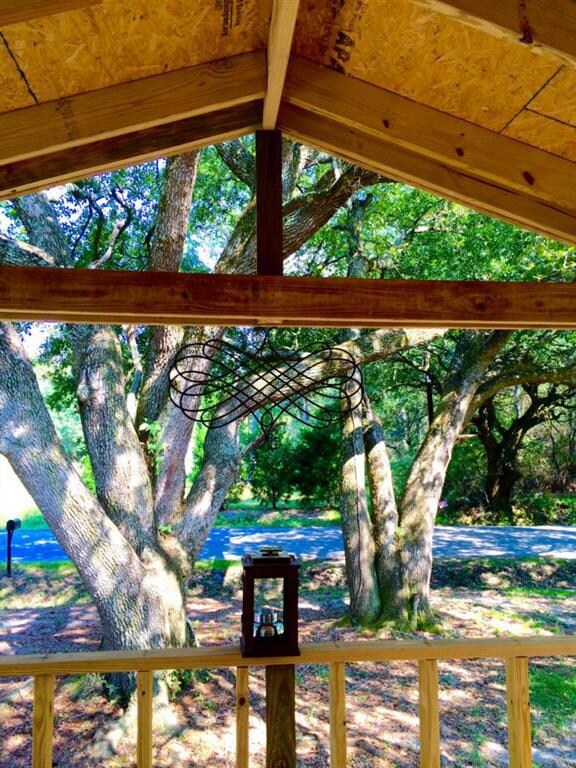 View from raised porch looking out to beautiful oa