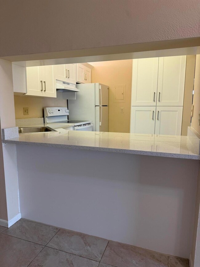 703 Sunny Pine Way unit B3, Greenacres, FL 33415 - photo 3