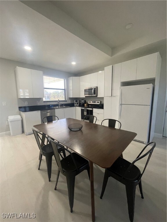 Dining room featuring sink