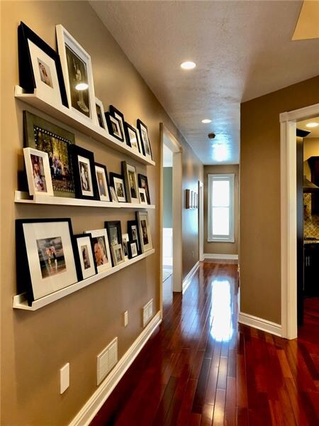 Dramatic Hallway Leads from Family/Greatroom down 