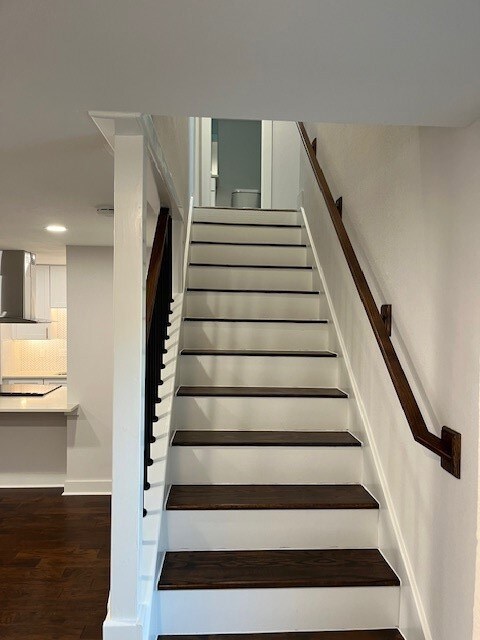 Stairs lead to the bedrooms and primary bathroom