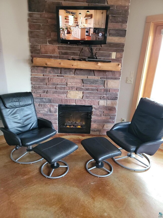 Living area featuring a fireplace