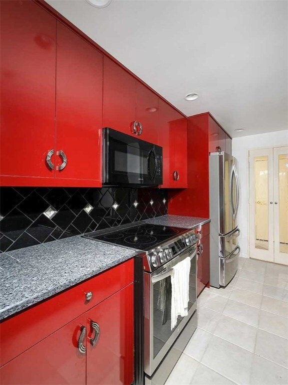 Chef's Kitchen adjacent to Dining room via Etched Glass Doors