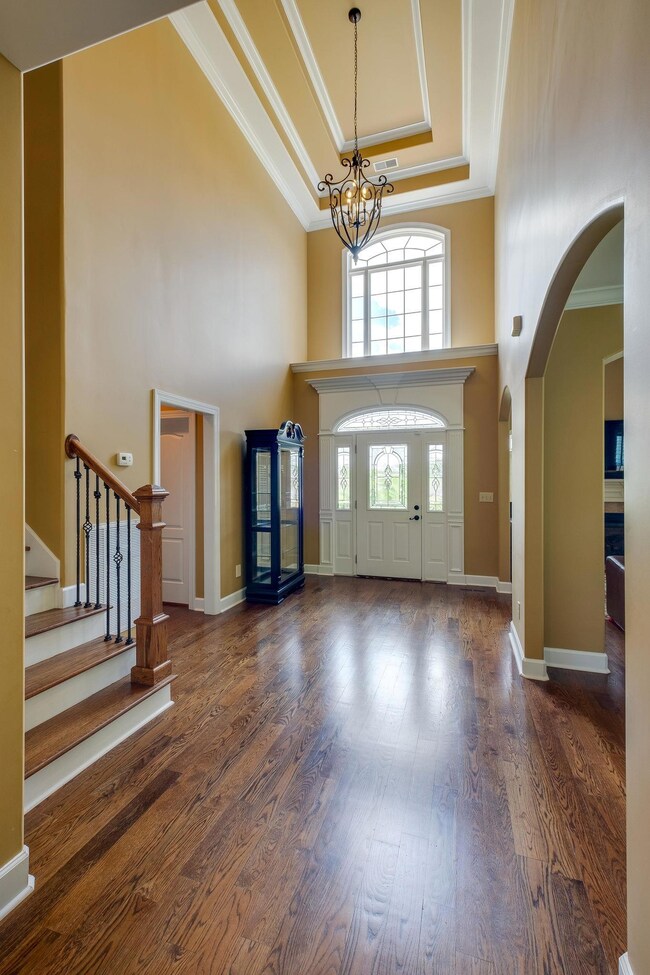 There is a coat closet and half bath with tile floor located in this area.