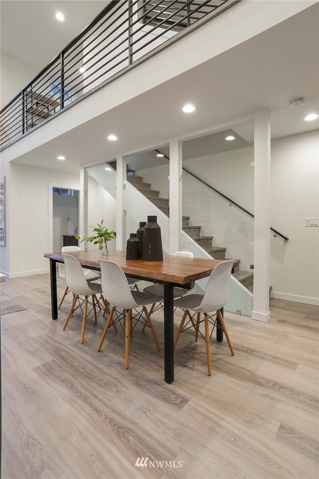 Open Staircase/Living Level through Glass Wall