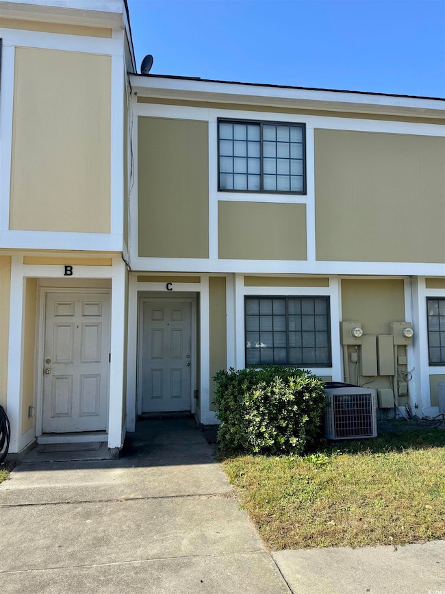 View of front of home featuring stucco siding