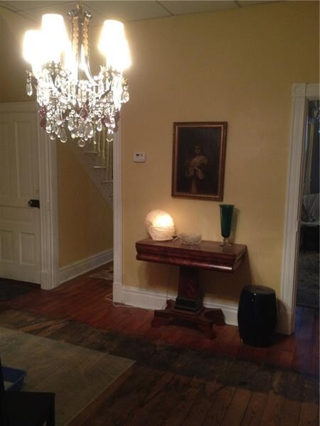 This large dining room includes a closet to the le