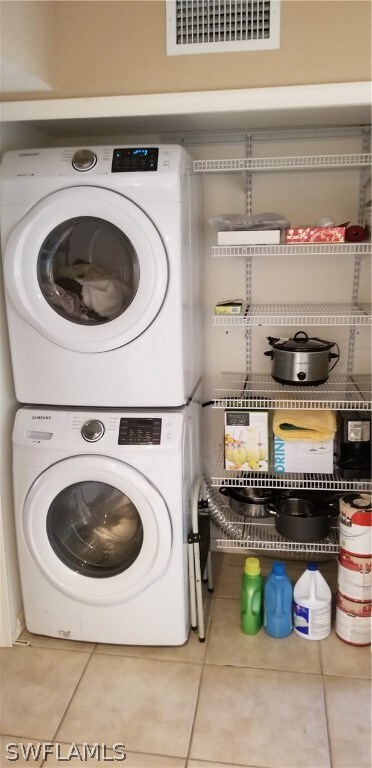 Newer full sized stackable washer and dryer