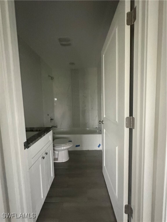 Bathroom featuring toilet and vanity