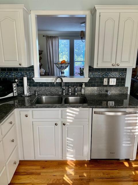 Kitchen sink looking into the dining area. 