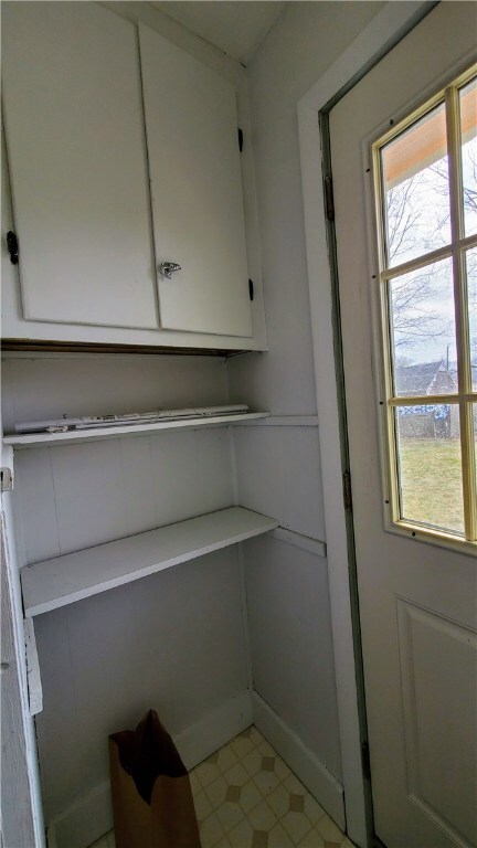 Storage area at the back; door to yard