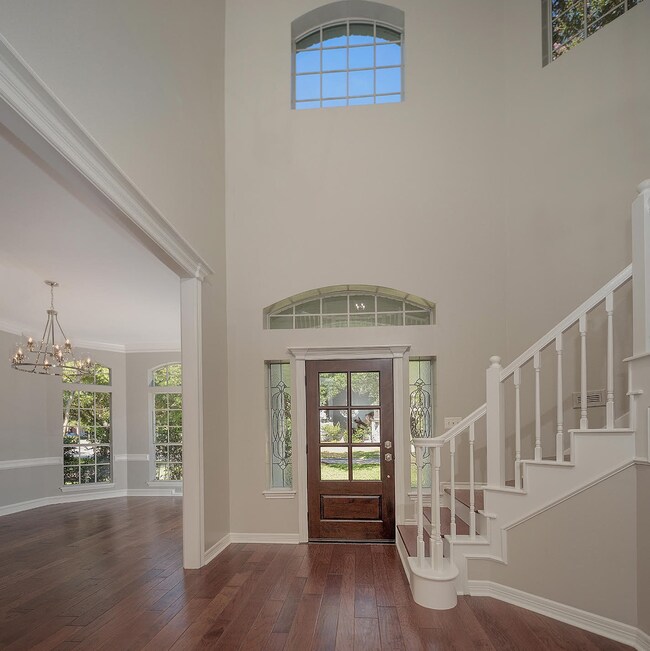 This Home Has It All! - Beautiful Entry w/ Wood Floors & Soaring Ceilings