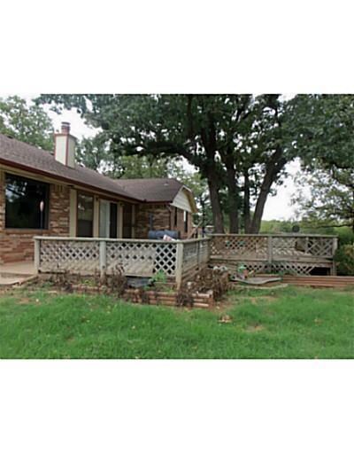 Exterior Back. back with large deck
