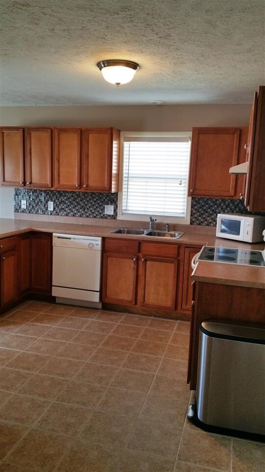 Spacious Beautiful Kitchen with Aristocraft Cabine