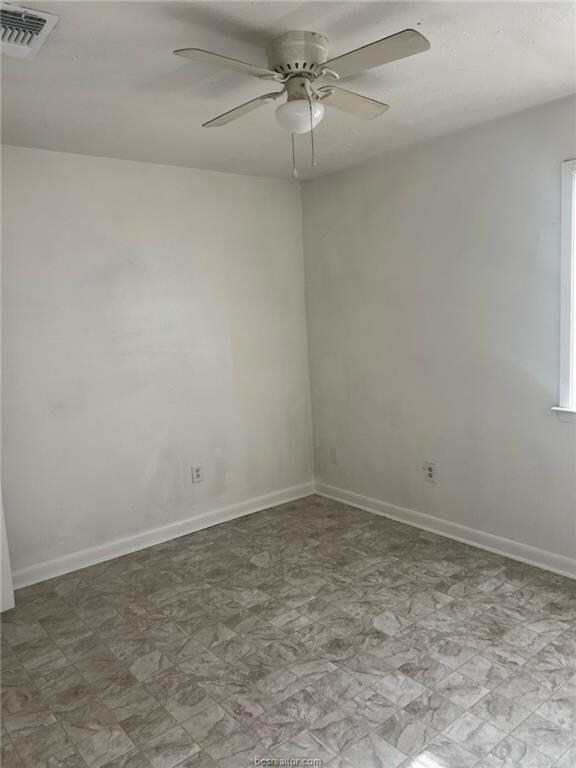 Unfurnished room with ceiling fan