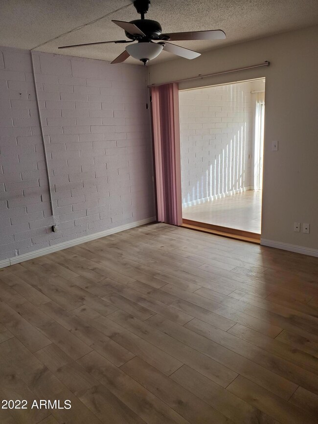 EXIT TO ENCLOSED BALCONY