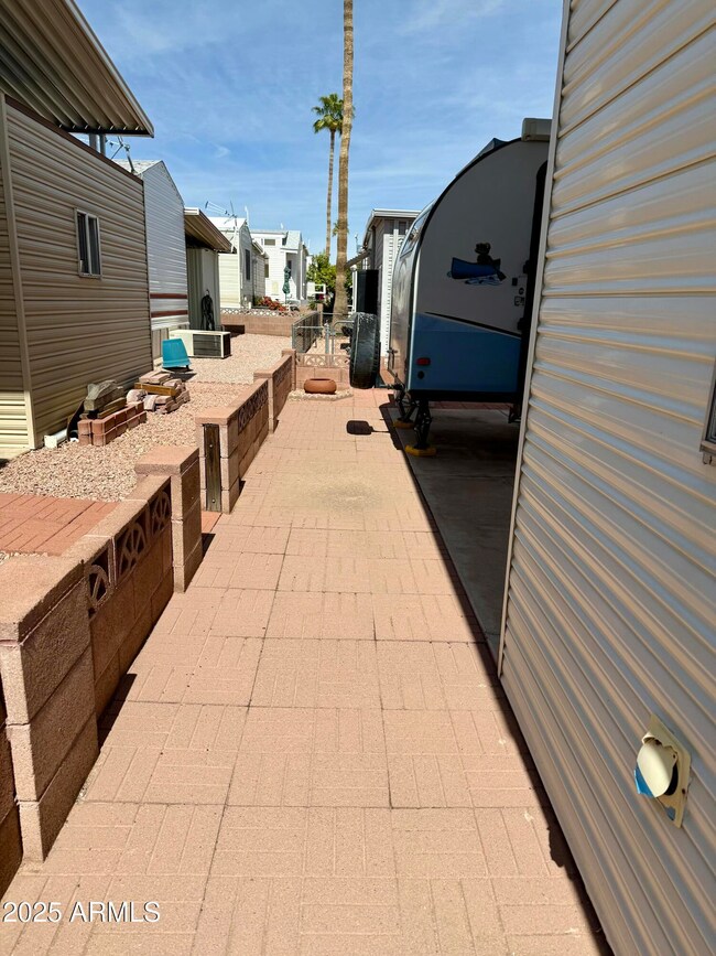 7750 E. Broadway Rd. #477