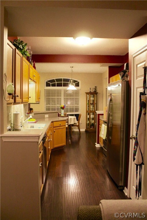Gorgeous kitchen with Corian Countertops, stainles