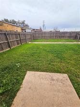 View of fenced backyard