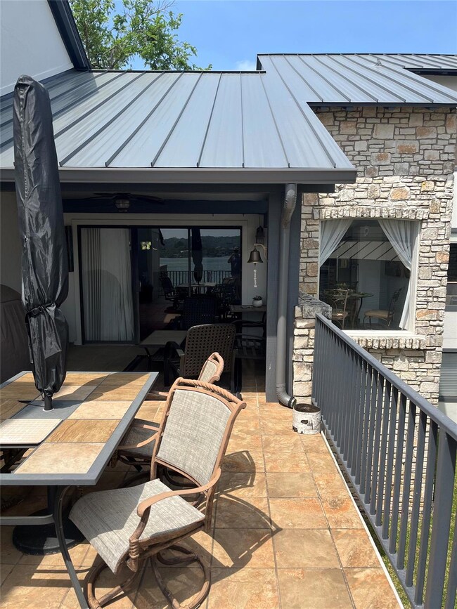 View of patio with outdoor dining space