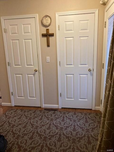 Closets in Foyer