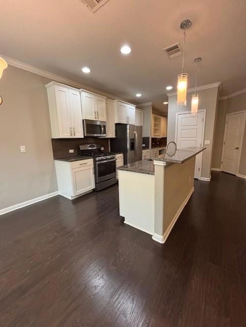 Kitchen with stainless steel appliances, ornament