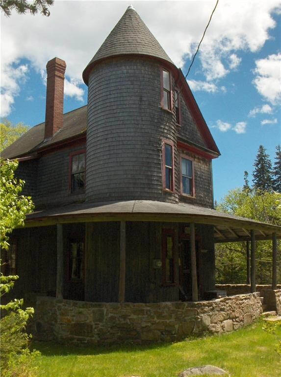 Turret-Stone wrap around covered porch