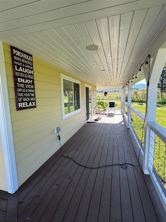 7' wide covered wrap-around porch with speakers