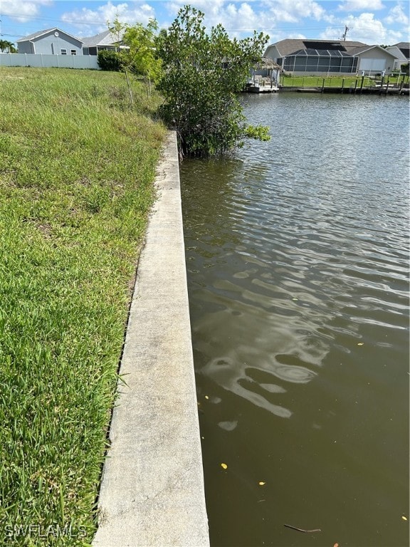 Dock featuring a water view