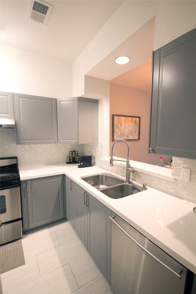 Quartz countertops, soft close cabinets