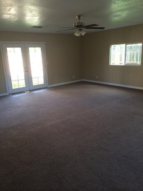 Huge family room with French door to rear yard.