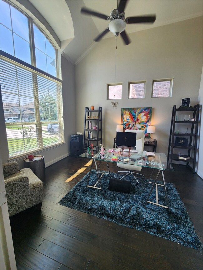 The office has beautiful hardwood floors and tons