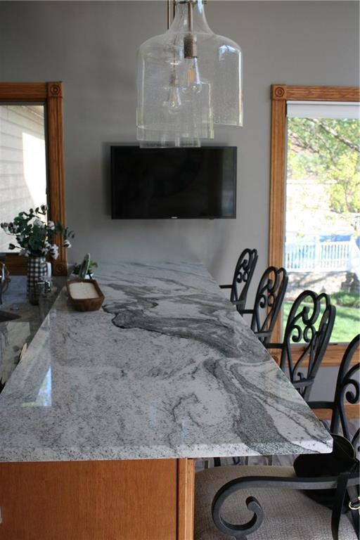 Bar in eat-in kitchen area with new granite counte