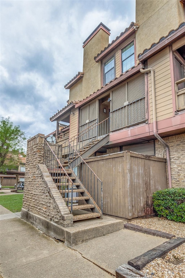 View of building exterior featuring stairs