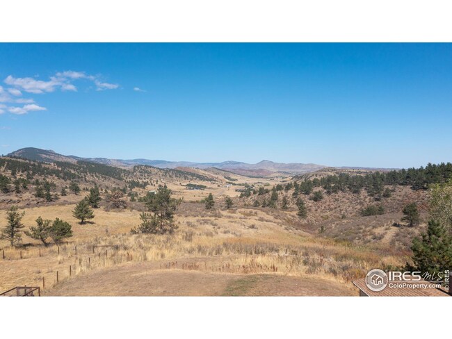 Arial shot of the land behind the home!