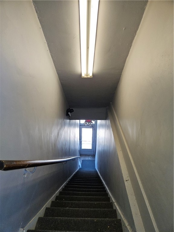 Stairs to 2nd floor from front of building