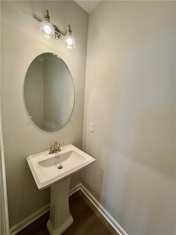 Bathroom featuring baseboards