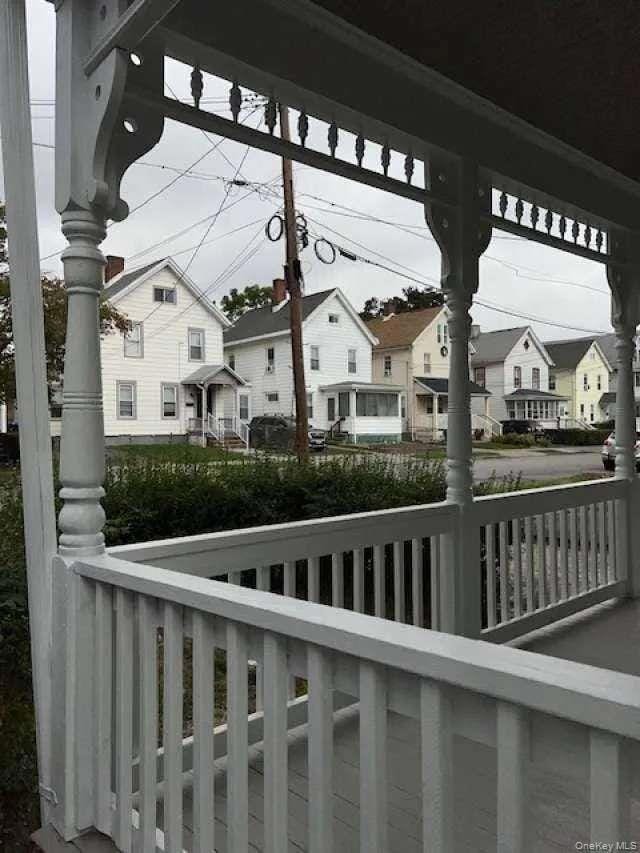 Balcony featuring a residential view