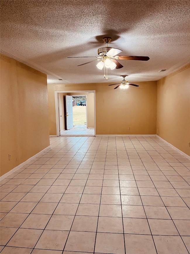 Open spaces for living room and dining room showing back entry