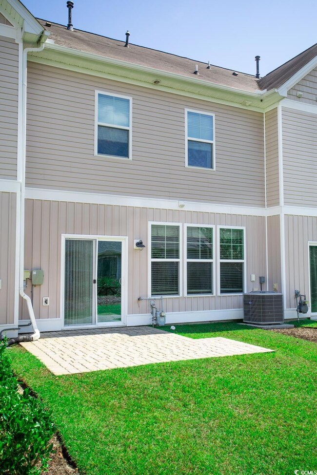 Rear view of house & patio area