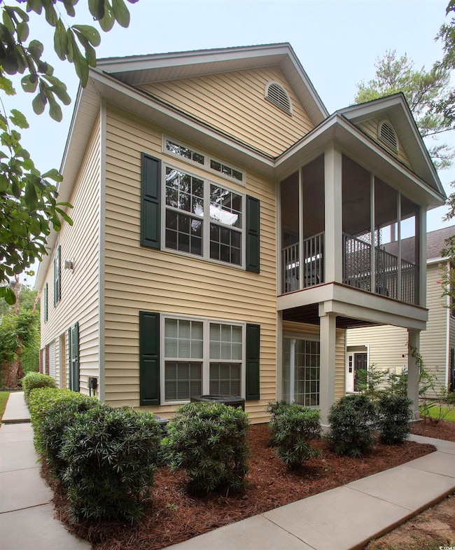 View of front of home with a balcony