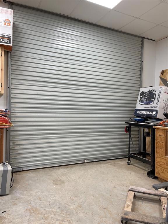 Large insulated garage door to shop