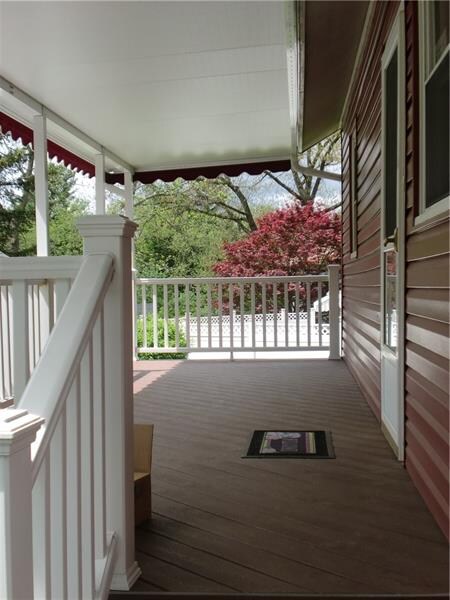 The 23 x 8 covered back porch is fabulous and main