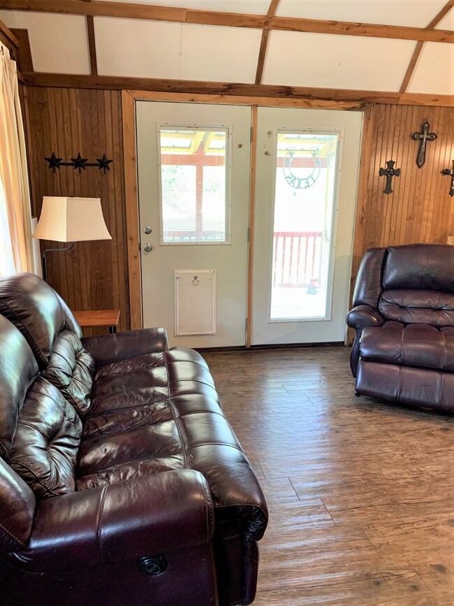 Double front doors with blinds enclosed in glass -