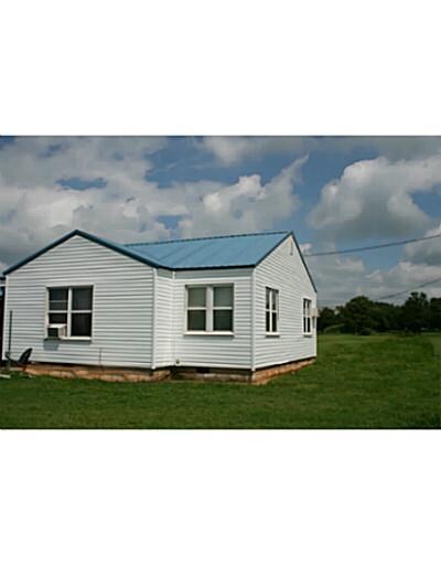 Exterior Back. All New  siding