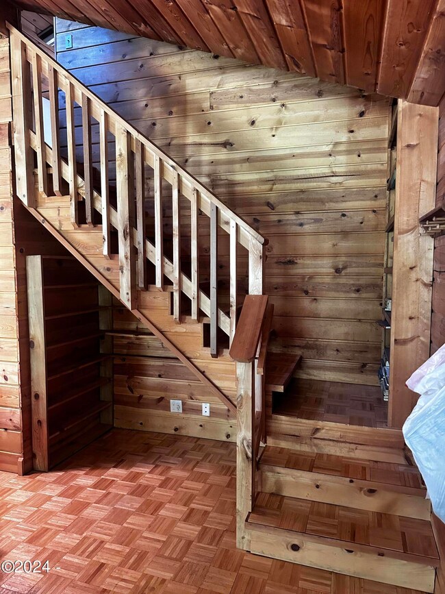 Living Room and Stairs to upper bedroom
