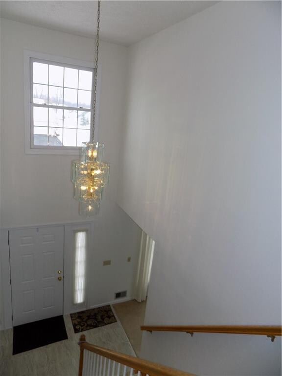 Two Story Foyer & Over Sized Window For Lots Of Na